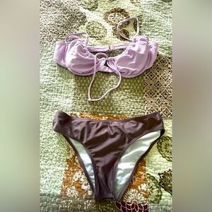 Bathing suit set XL too fits more medium and medium bottoms.